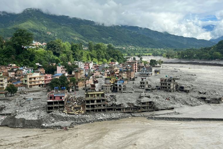 Setting souls free: Nepali families hold symbolic funerals for missing after floods